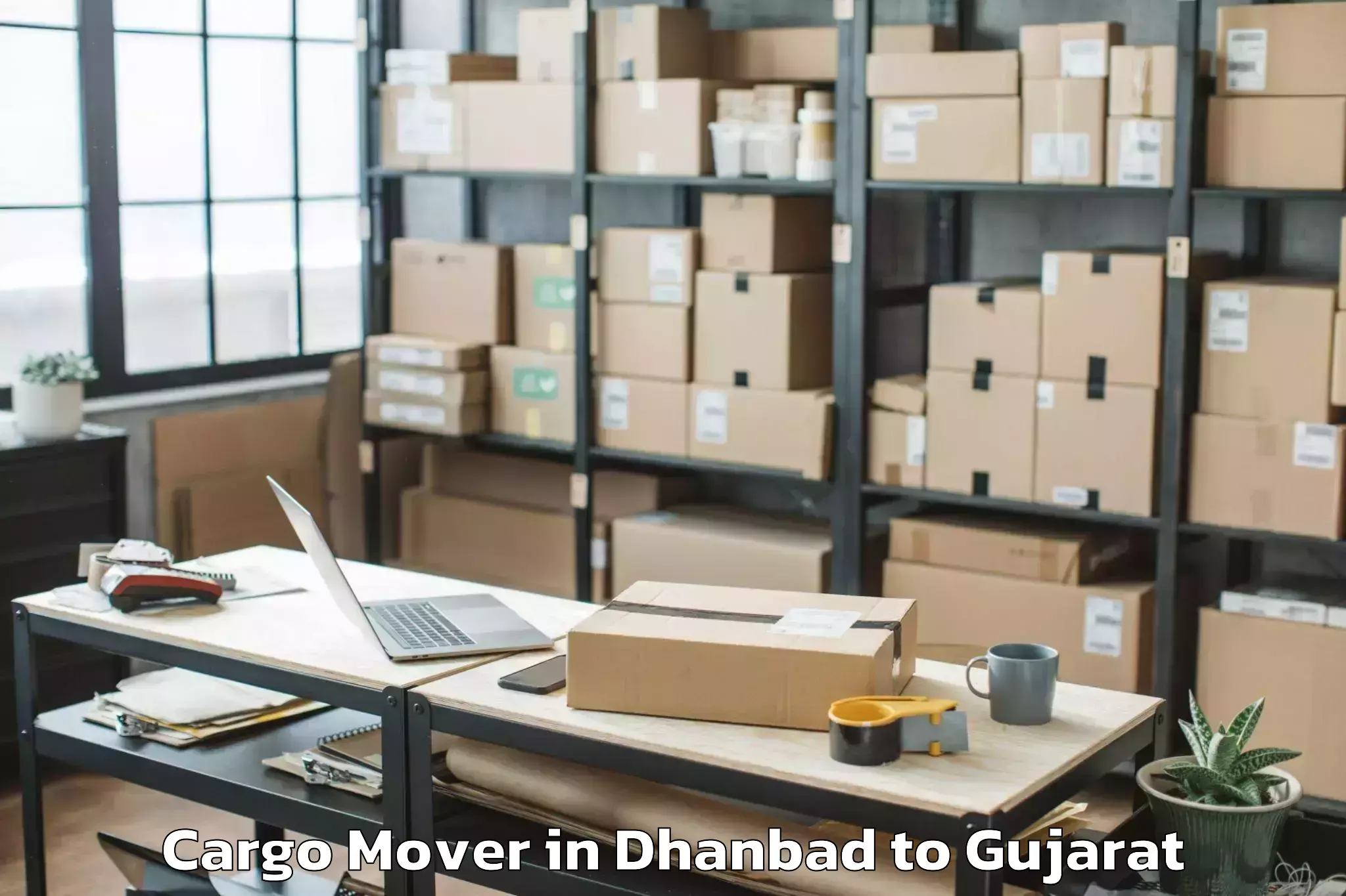 Top Dhanbad to Bedi Cargo Mover Available